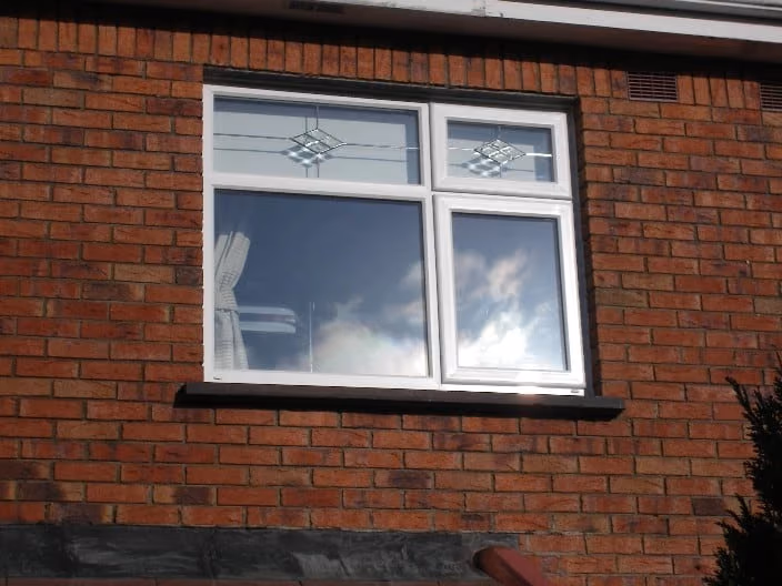 Casement windows on brick house