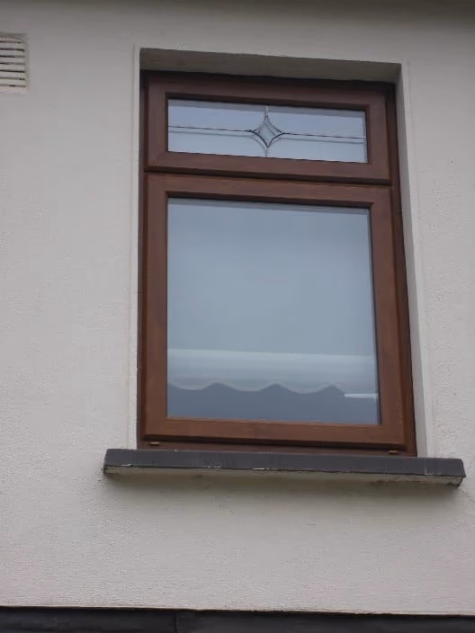 uPVC window with a top vent opener fitted by Airtight — trickle vents provide similar secure background ventilation