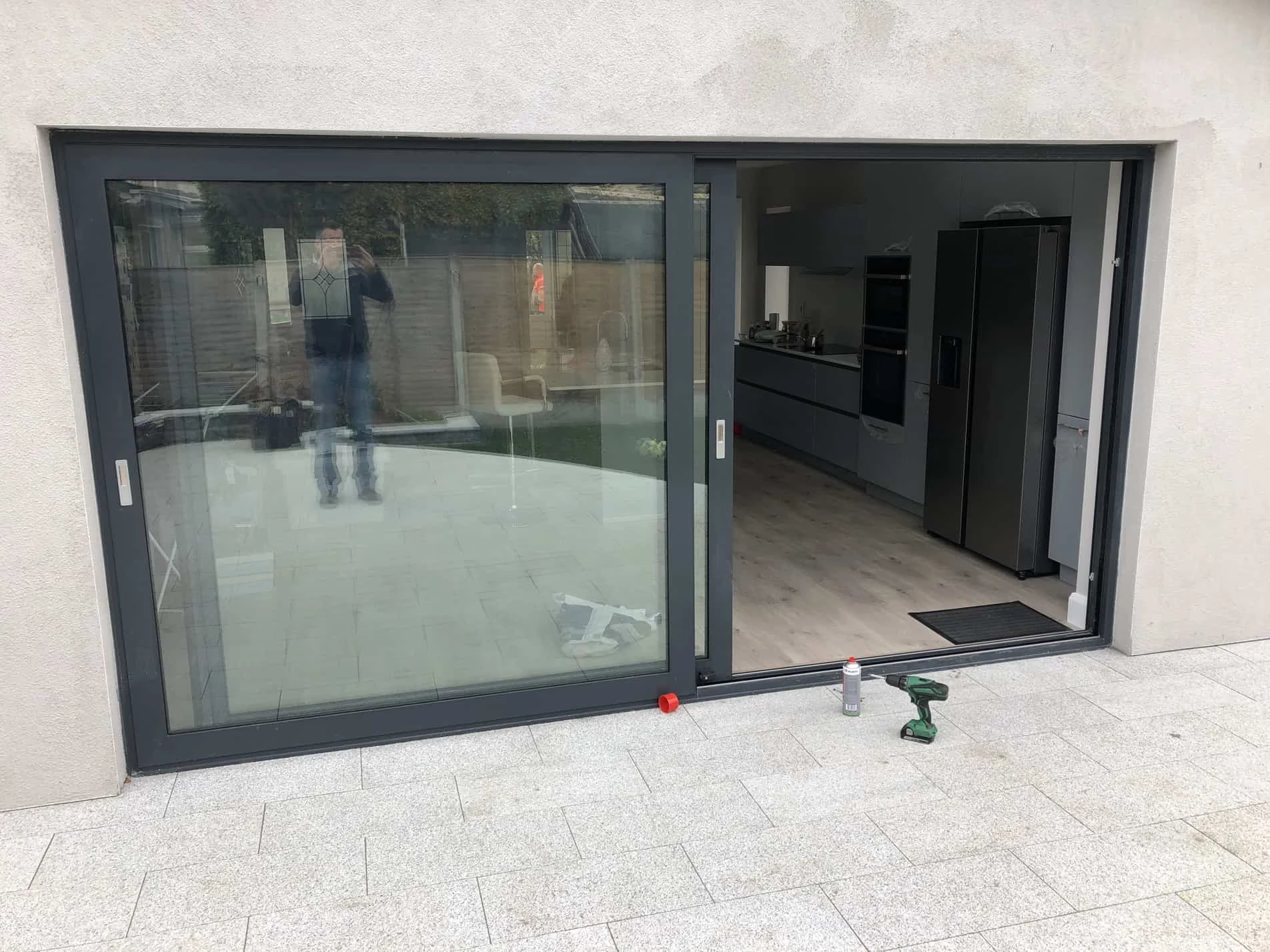 Modern kitchen with large glass Patio sliding Door