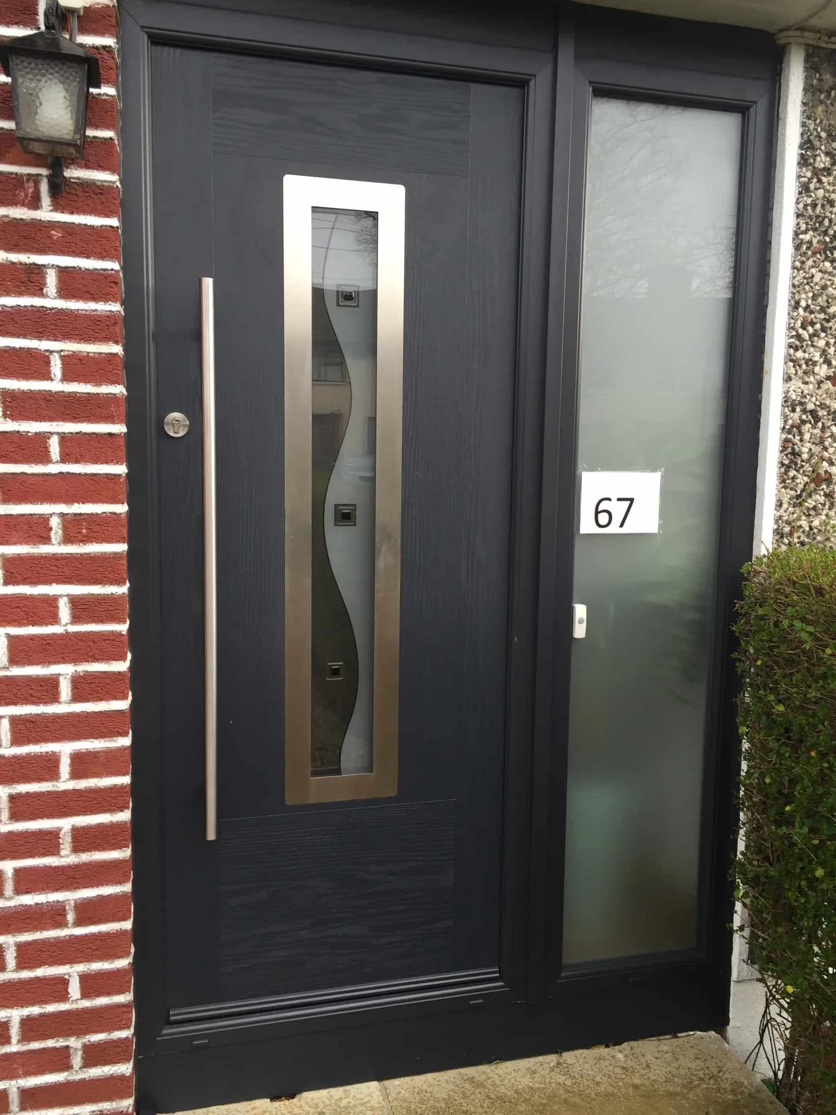 Black composite front door, modern Dublin terrace