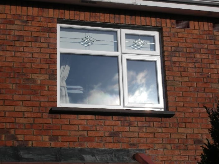 Casement windows on brick house