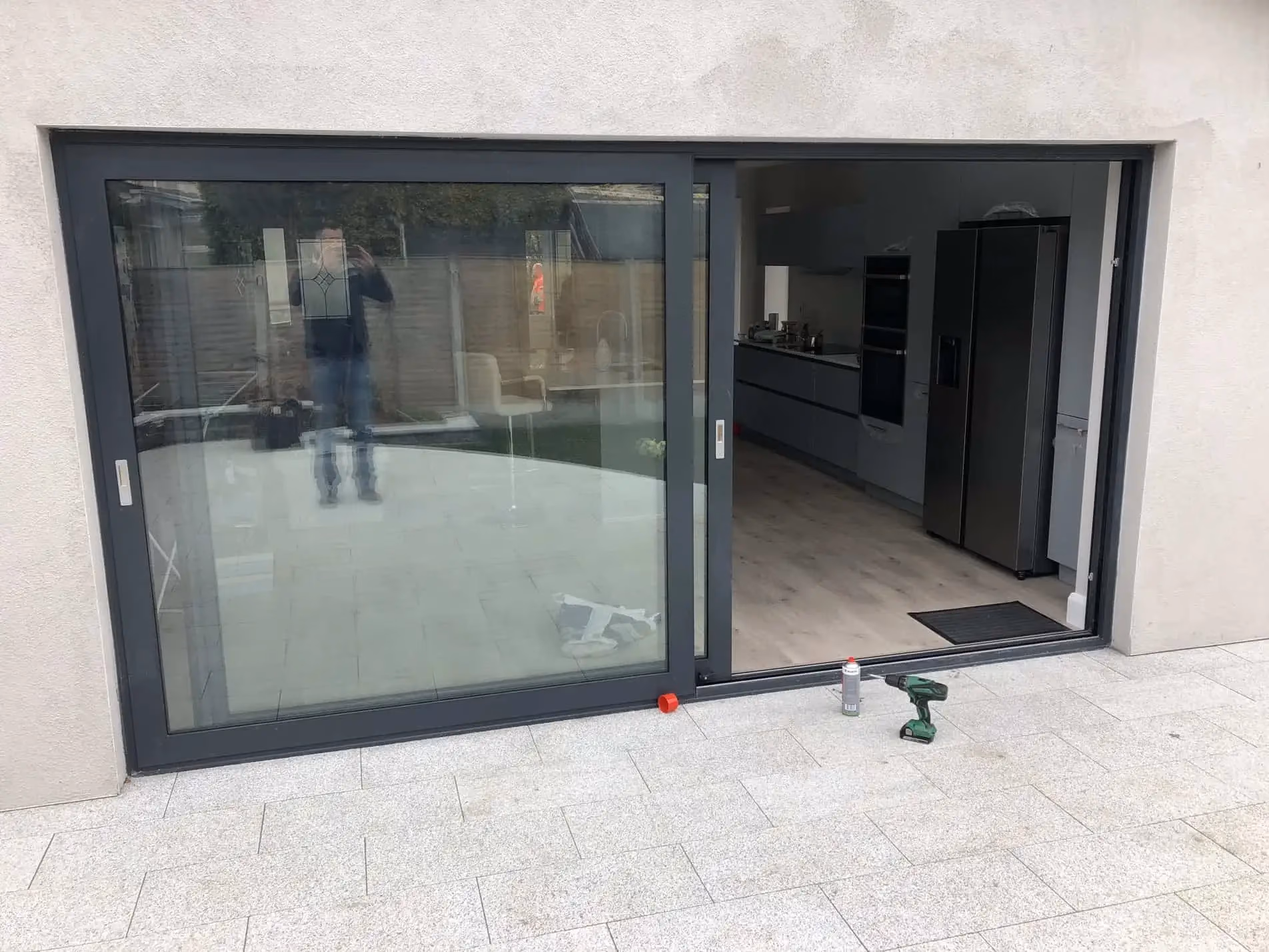 Modern kitchen with large glass Patio sliding Door