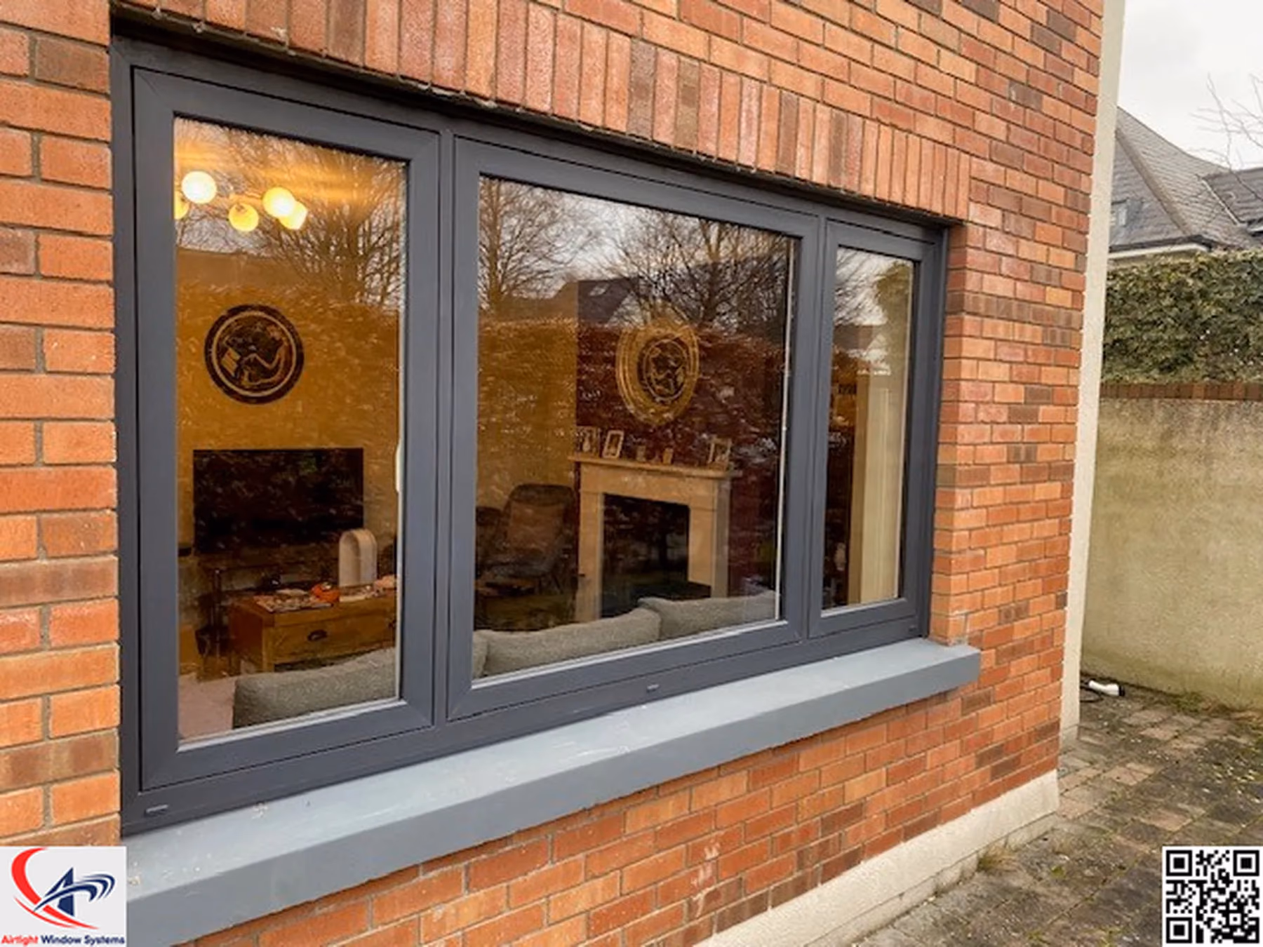 White uPVC sliding sash window close-up on a Victorian home