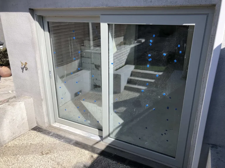 Patio sliding Door with blue tape markings